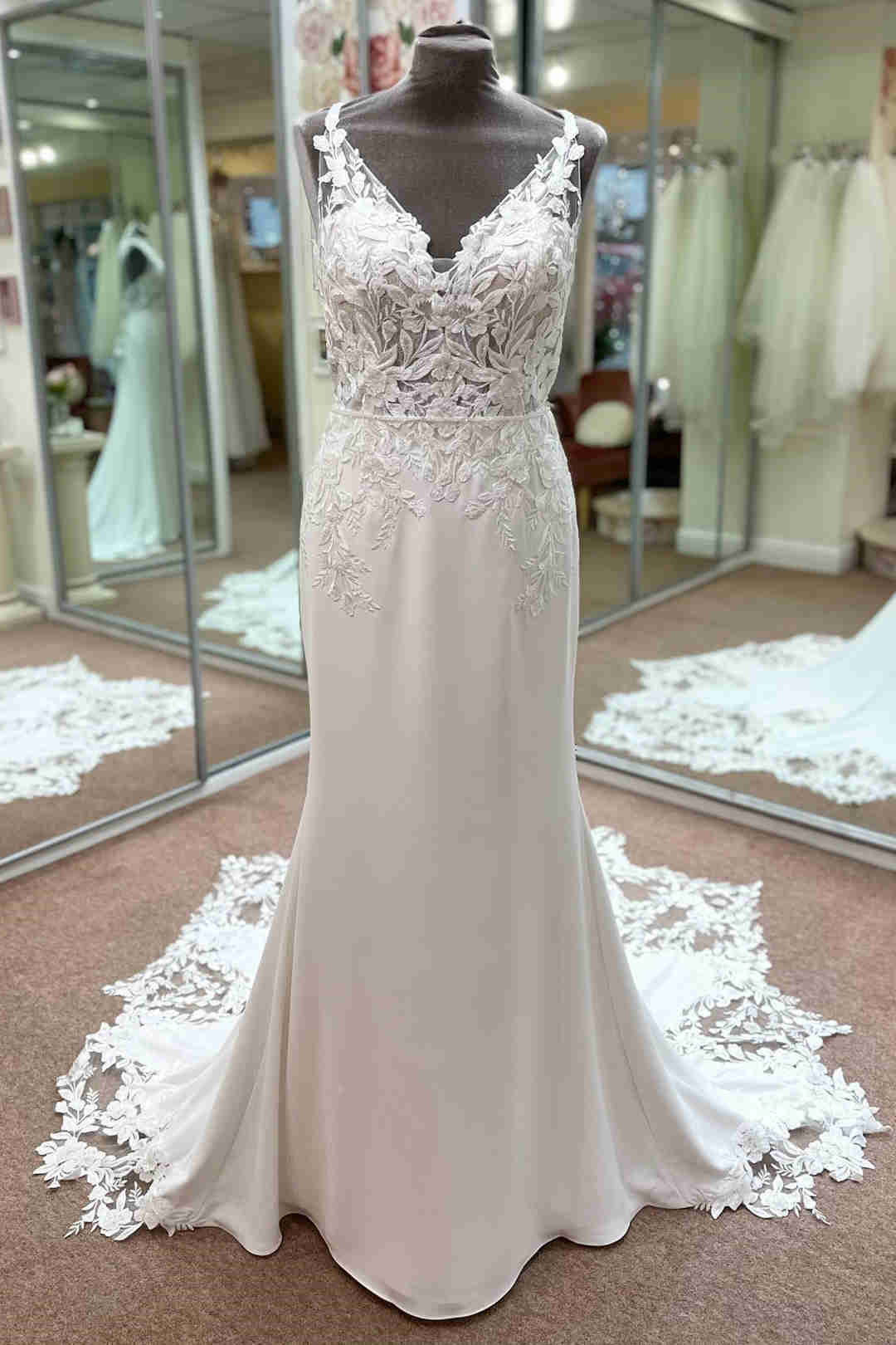 Backless V-Neck White Appliqued Wedding Dress with Train FancyVestido Backless V-Neck White Appliqued Wedding Dress with Train FancyVestido